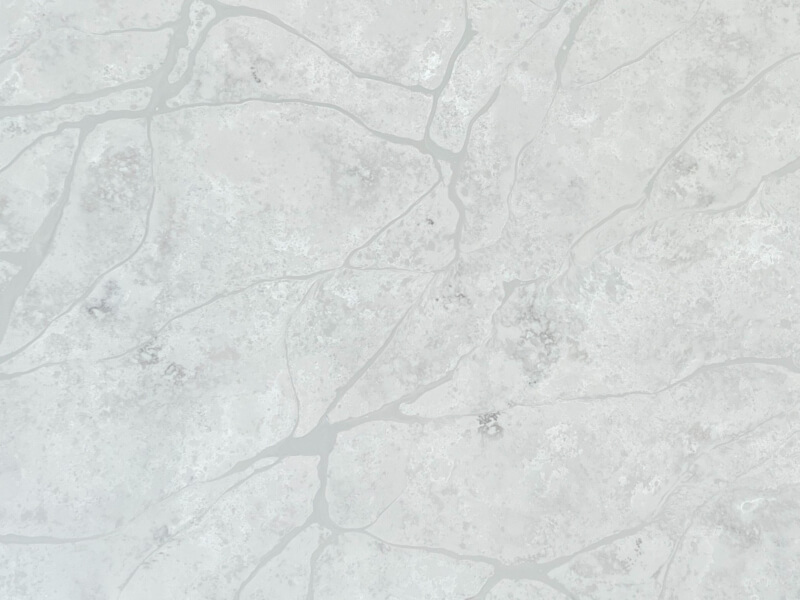 Crema Ice Leathered Grey, White Quartz Worktop by Bloomstones — image 2